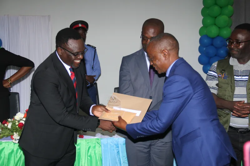 Prof Thomas T Y Sukwa receiving his award at the NHRTI jubilee celebration