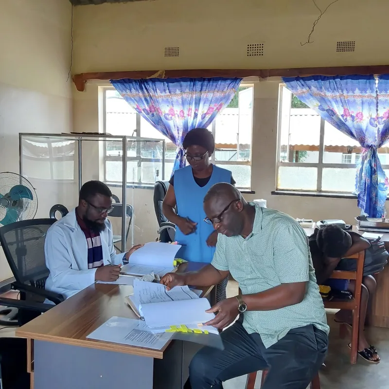 NHRTI team reviewing research records